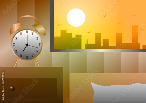 Alarm clock at the window beside the bed in the morning.