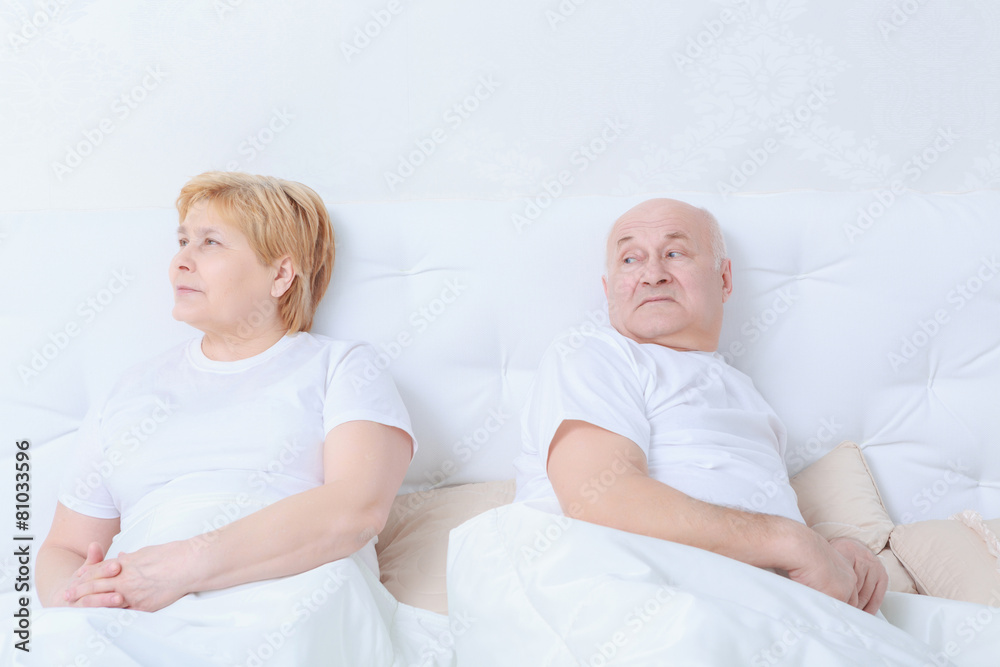 Couple interacts in bed Couple interacts in bed