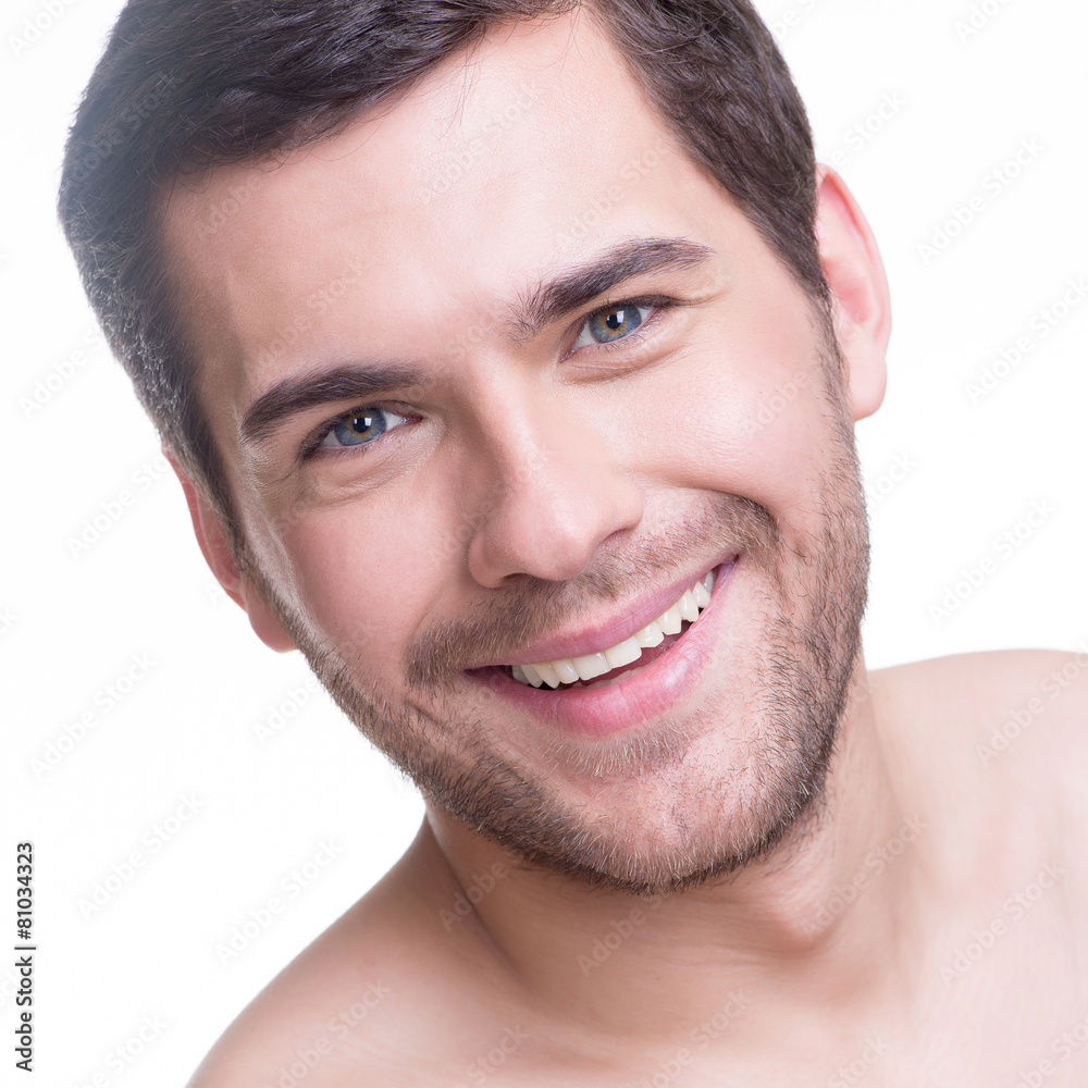 Fototapeta premium Portrait of handsome smiling young man.