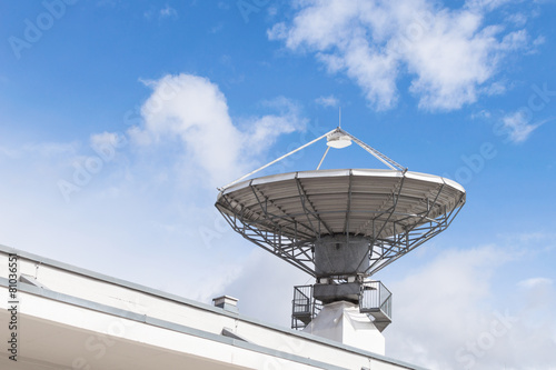 Military radiolocator station with parabolic radar antenna dish