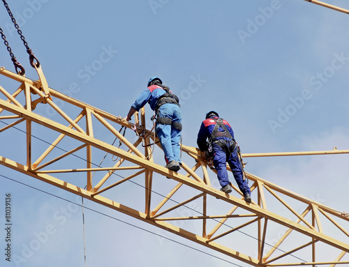 Schilderij op canvas Workers on the crane