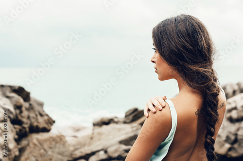beautiful girl on the beach alone