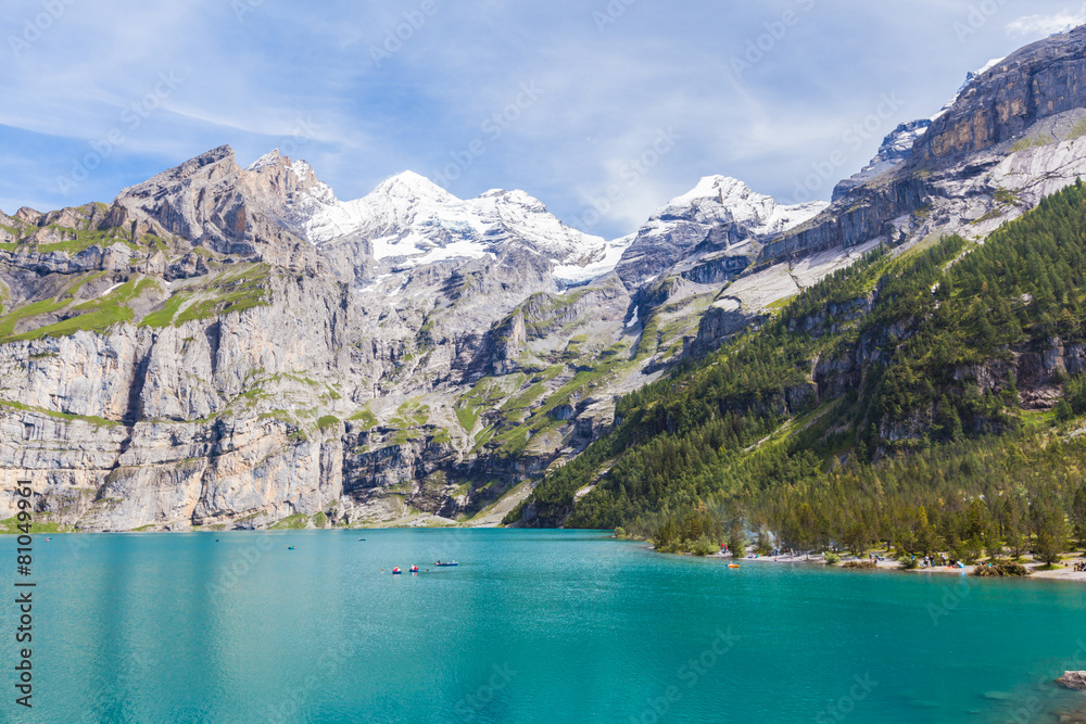 Stunning view of Oeschinensee (Oeschinen lake) with Bluemlisalp Stunning view of Oeschinensee (Oeschinen lake) with Bluemlisalp