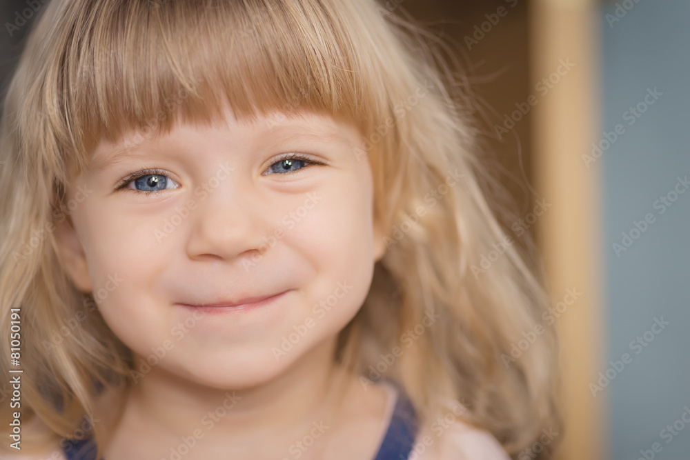 Close-up portrait of adorable smiling little girl. Close-up portrait of adorable smiling little girl.