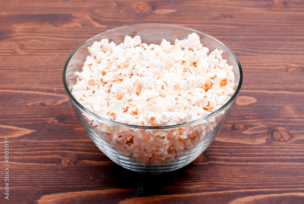 popcorn in a bowl on the table top view popcorn in a bowl on the table top view