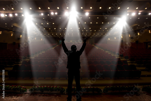 Silhouette of actors in the spotlight