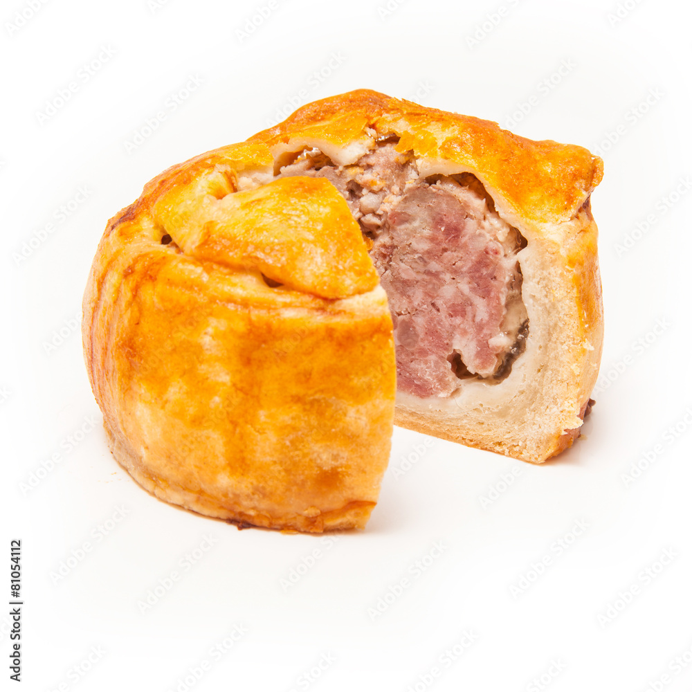 Pork pie isolated on a white studio background.