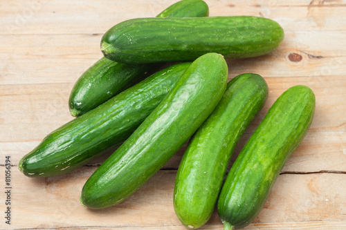 a pile of fresh picked cucumbers