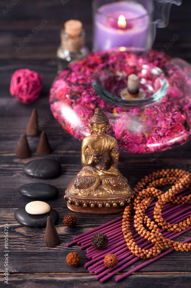 Obraz premium Buddha statue, zen stones and incense. concept of meditation