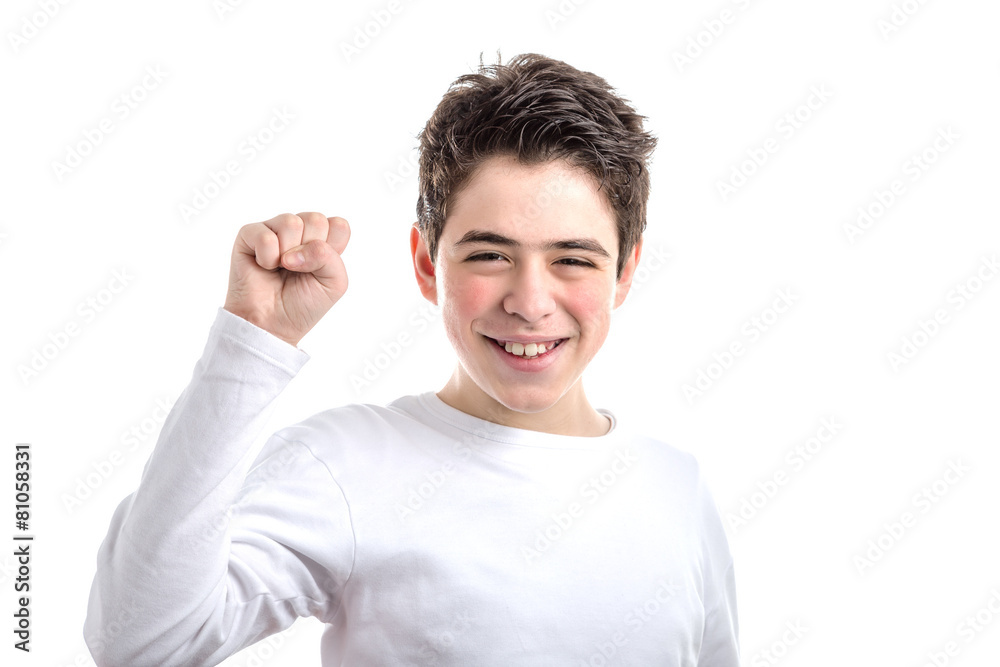 Latin smooth-skinned boy skin shows fist as gesture of power Latin smooth-skinned boy skin shows fist as gesture of power