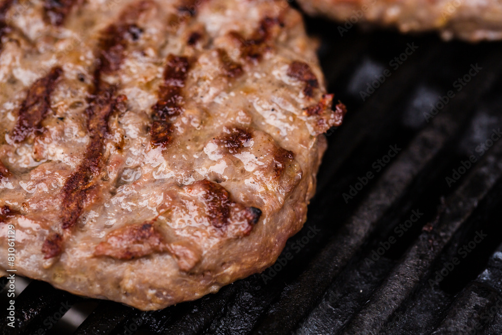 Preparing a batch of grilled ground beef patties or frikadeller Preparing a batch of grilled ground beef patties or frikadeller