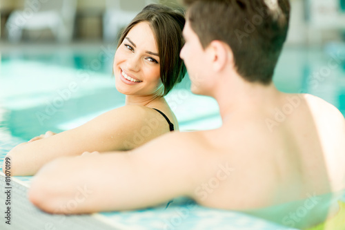 Young couple in the swimming pool © BGStock72