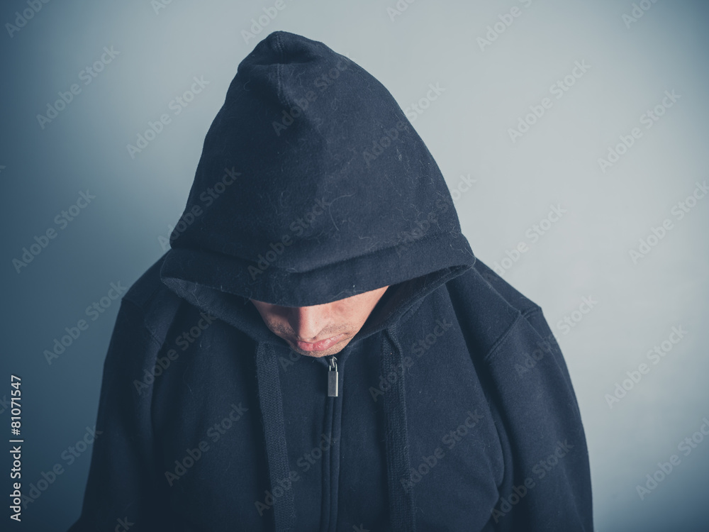 Young man wearing a hooded top Young man wearing a hooded top