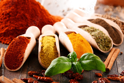 Fototapeta Naklejka Na Ścianę i Meble -  Variety of spices on kitchen table