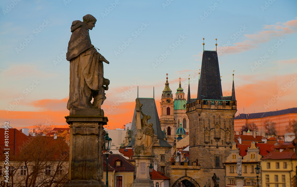 Dramatic sunrise view of the towers of Mala Strana from Charles