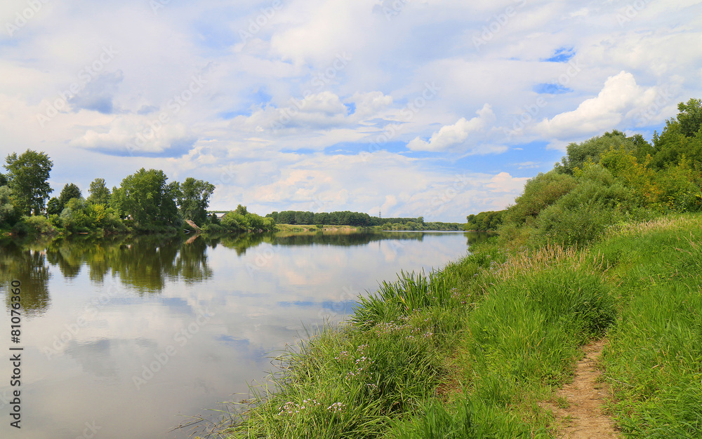 Fototapeta premium River and its banks, Sky is cloudy.