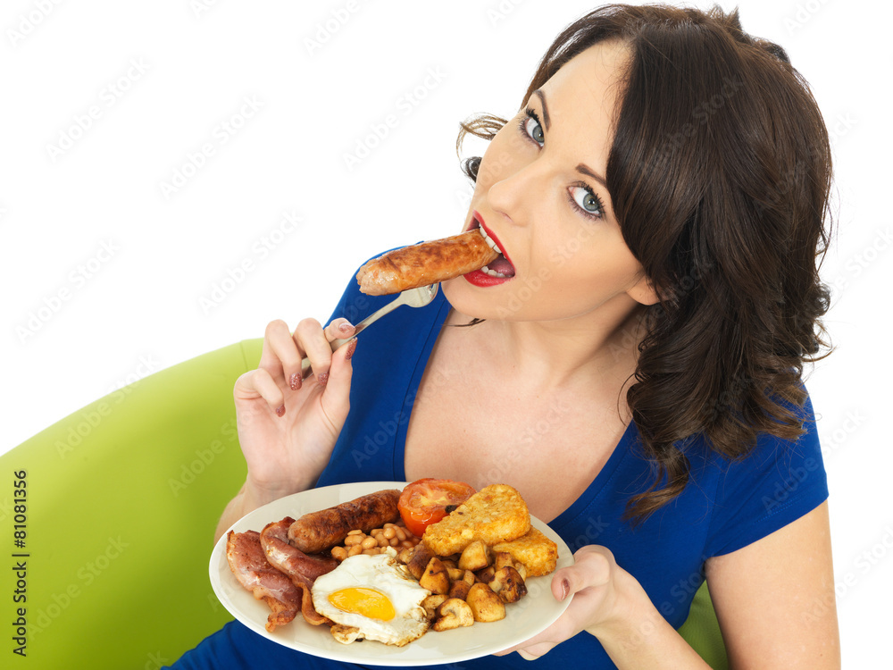 Young Woman Eating a Full English Breakfast Young Woman Eating a Full English Breakfast