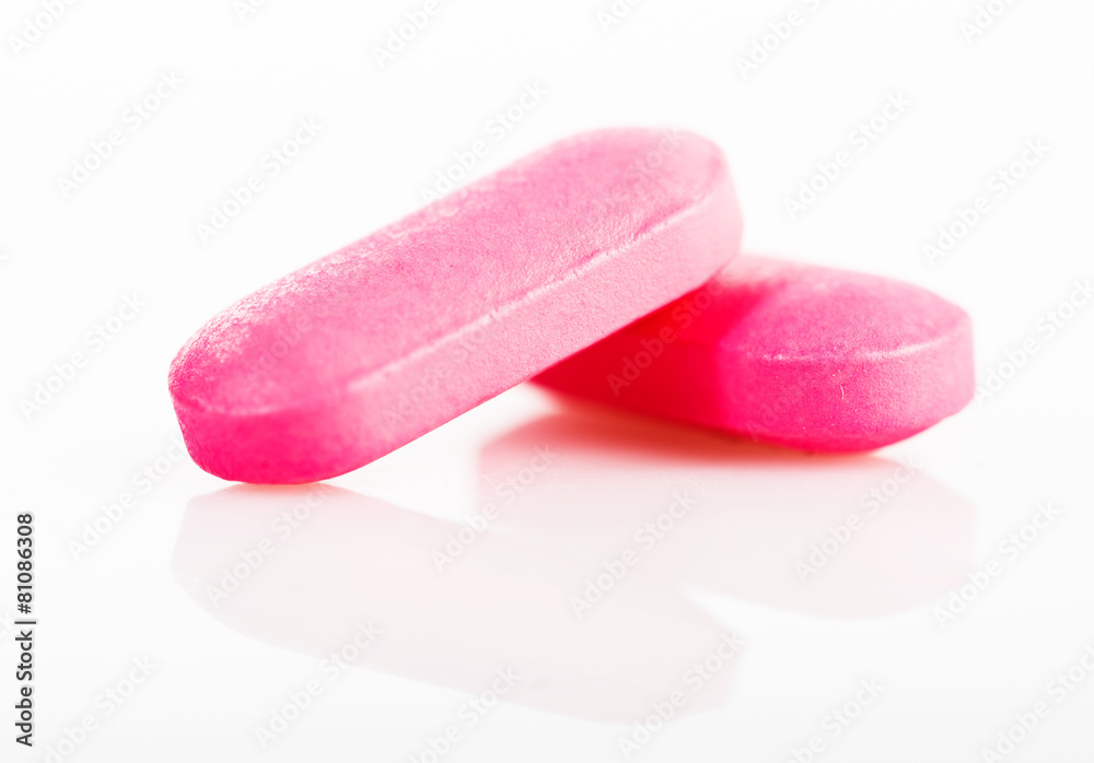 Group of pink medical pills isolated Group of pink medical pills isolated