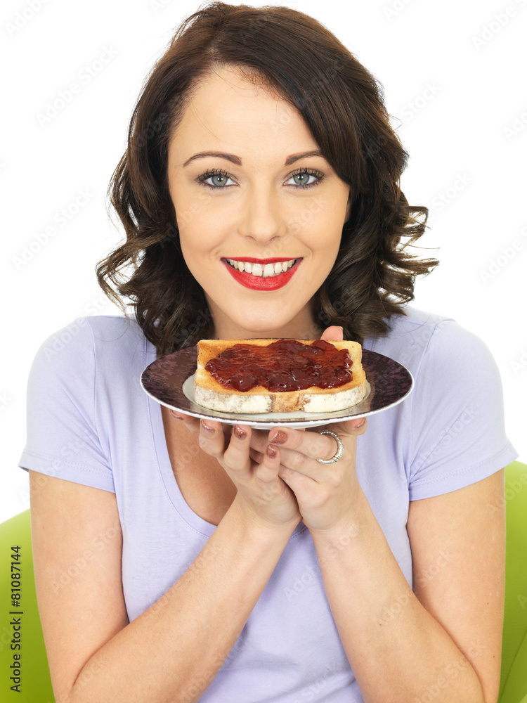 Young Woman With Strawberry Jam on Toast