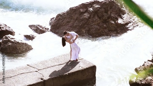 Couple in love at the beach in the morning.