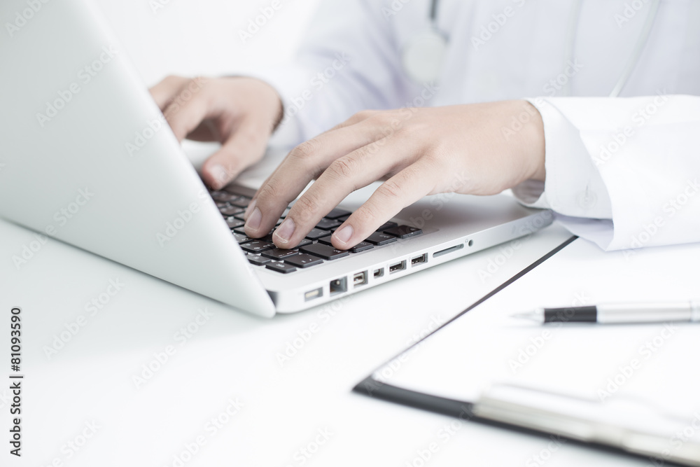 Close-up of a medical worker with laptop Close-up of a medical worker with laptop