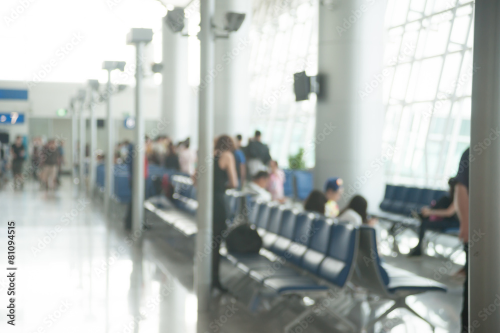 Blurred photo of an airport terminal.