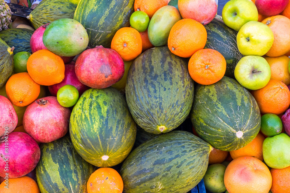 An assortment of tropical fruits seen at a market