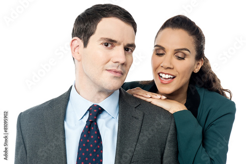 Attractive business couple posing together