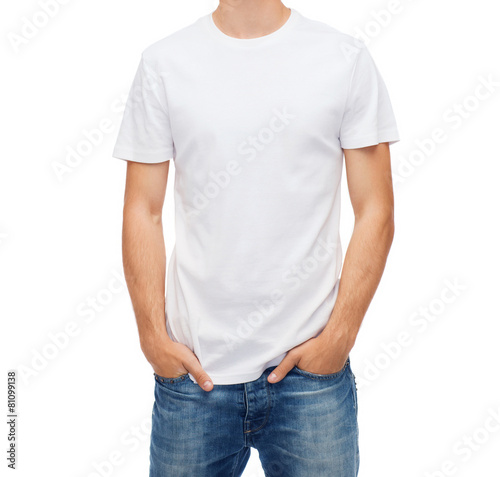 smiling young man in blank white t-shirt