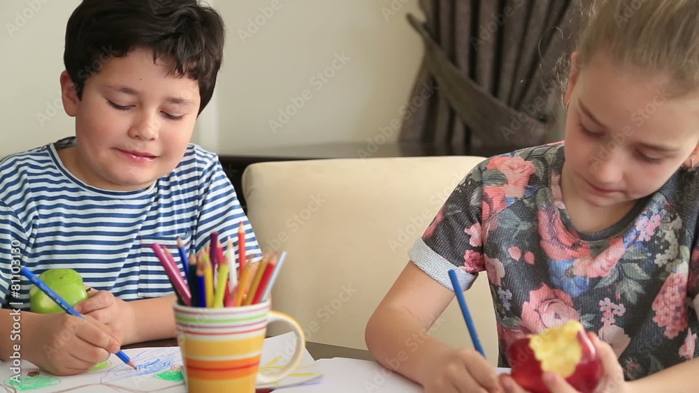 Little girl and boy drawing at home Little girl and boy drawing at home