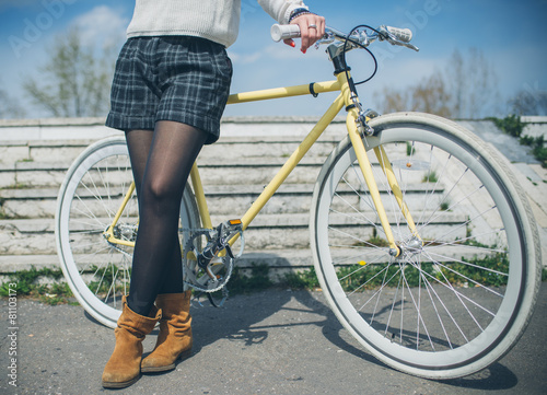 fashionable woman with vintage bike © chika_milan