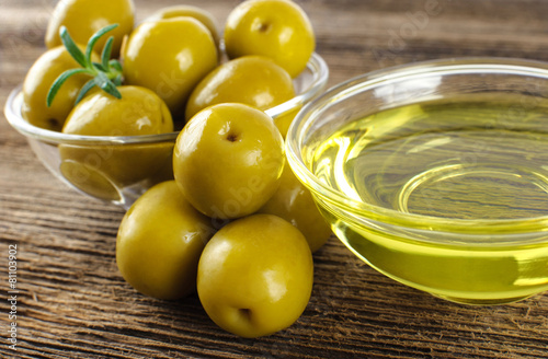Green marinated olives, olive oil.