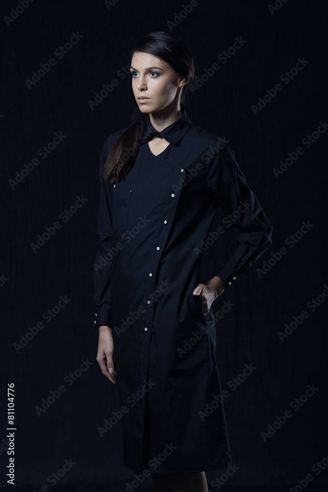 Fashion photo of young magnificent woman in black shirt Fashion photo of young magnificent woman in black shirt