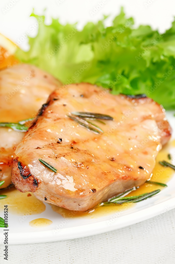 Grilled pork cutlet with orange sauce