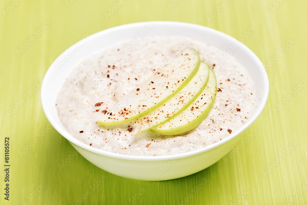 Oatmeal porridge with apple slices and cinnamon Oatmeal porridge with apple slices and cinnamon