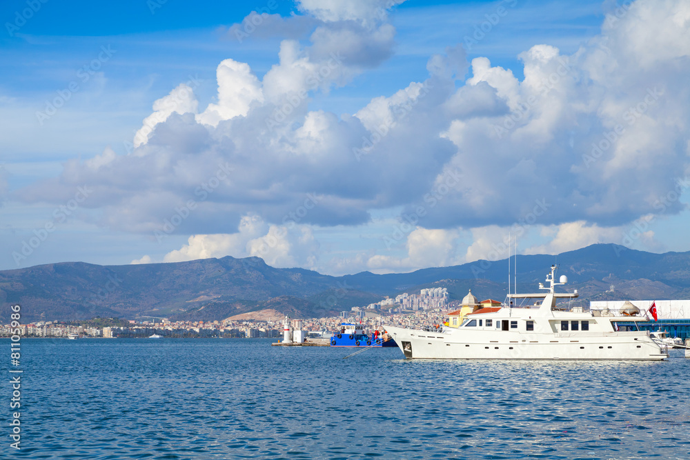 Coastal cityscape with moored ships. Izmir,Turkey