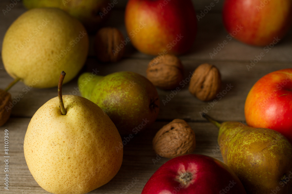 pear with apples on a brown background