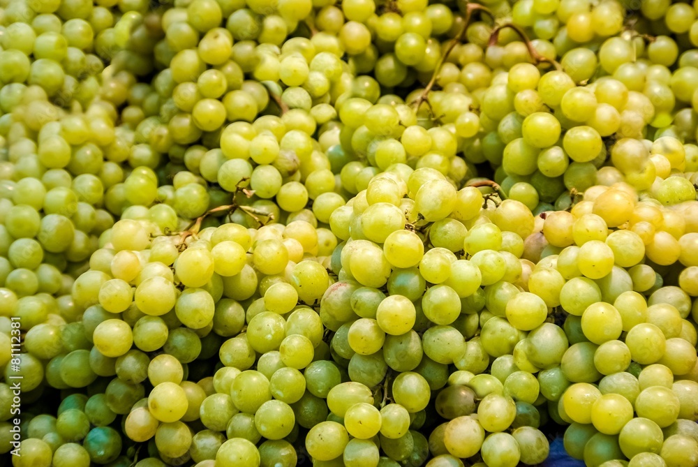 Bunches of green grapes for sale at farmers market. Bunches of green grapes for sale at farmers market.