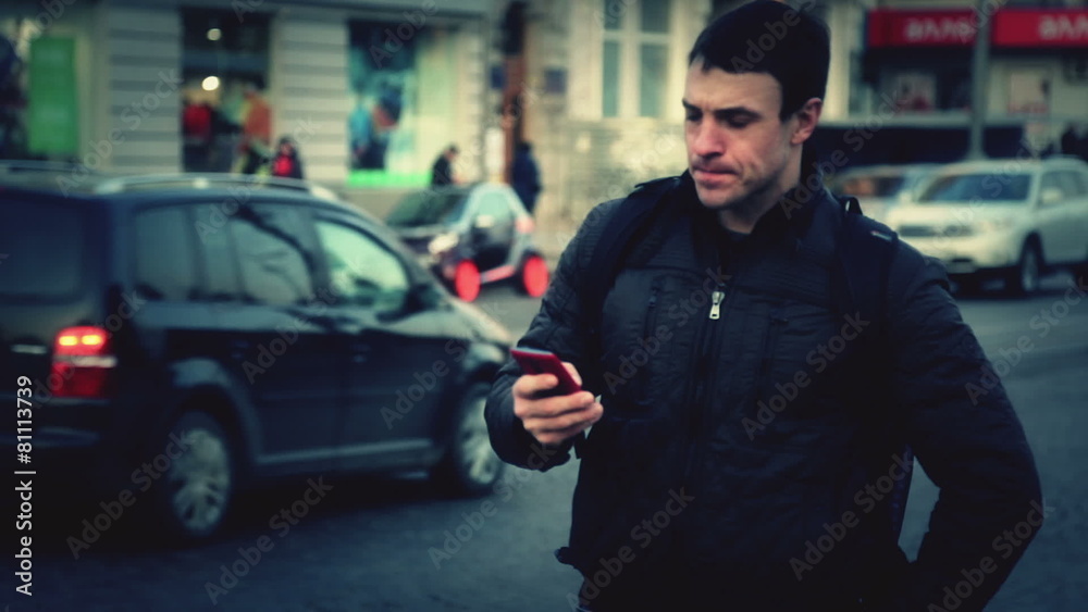 Portrait of a young man talking on the phone. Portrait of a young man talking on the phone.