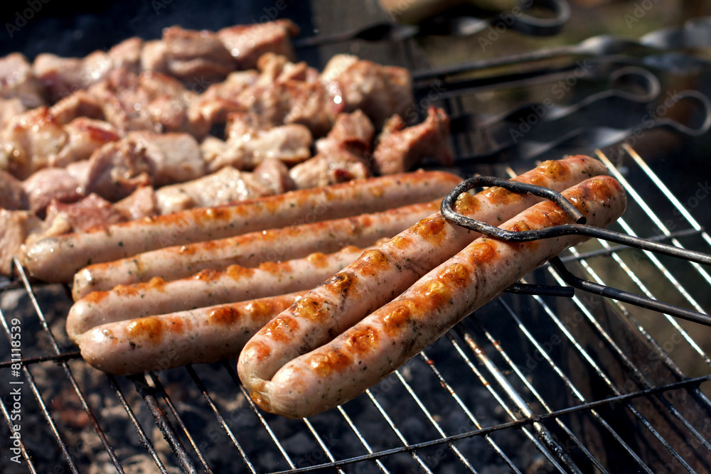 Sausages on grill in summer