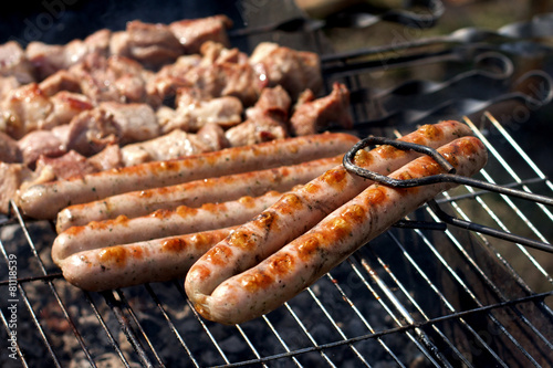 Sausages on grill in summer