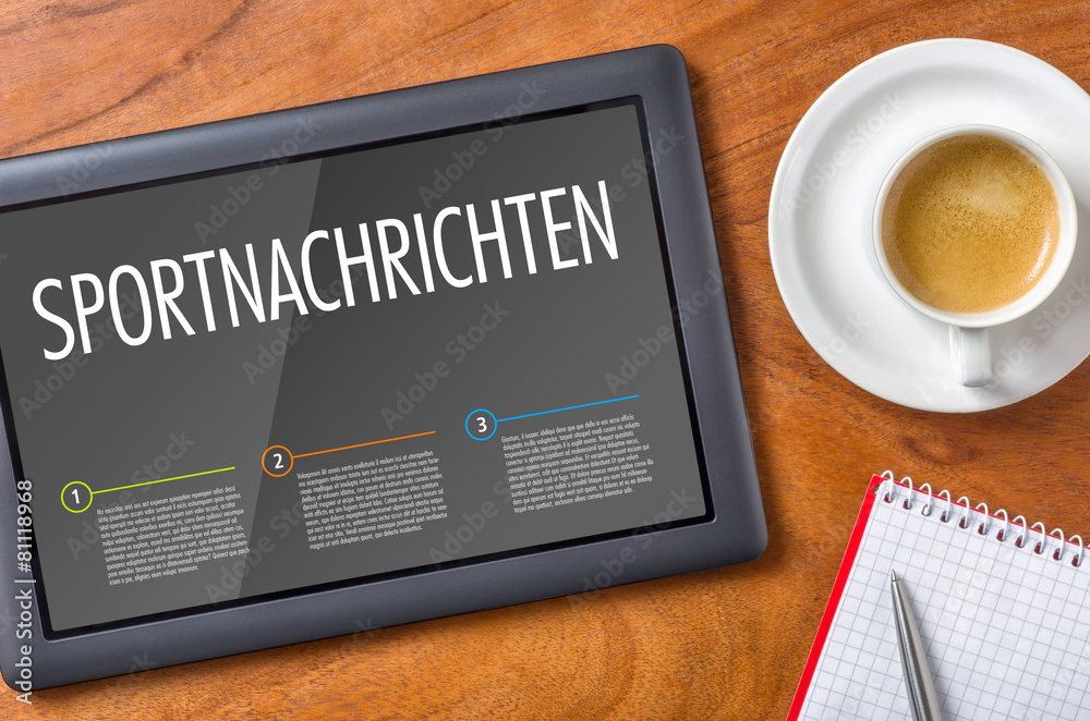 Tablet auf einem Schreibtisch - Sportnachrichten Tablet auf einem Schreibtisch - Sportnachrichten
