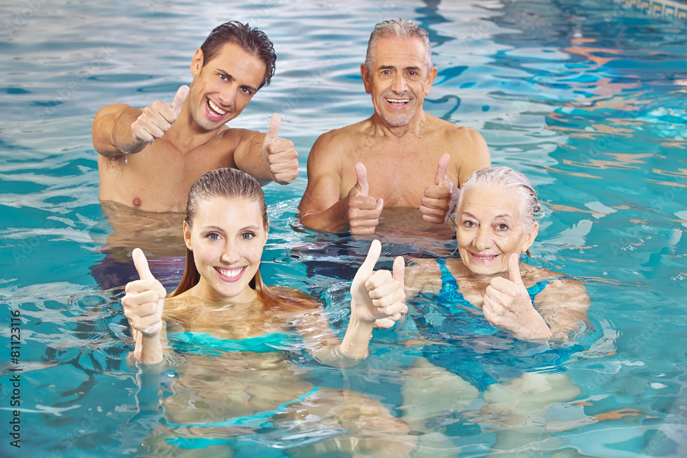 Fototapeta premium Group in water holding thumbs up
