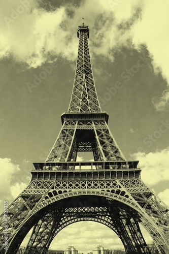 General view of Eiffel tower in Paris with old postcard effect