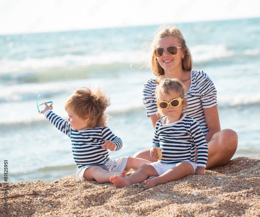 Mother with children on the beach Mother with children on the beach