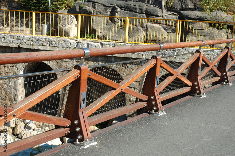 New wooden barrier on bridge