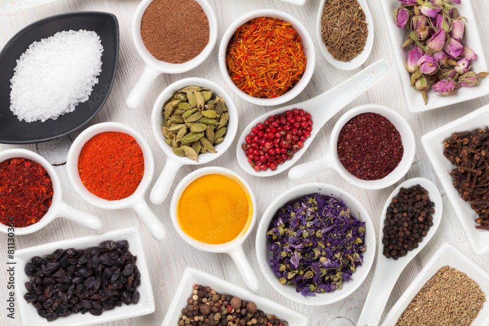 Various spices on wooden background