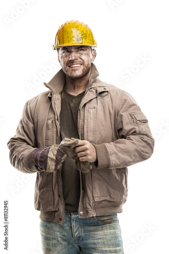 Photography Young dirty Worker Man With Hard Hat helmet  .holding a work glo