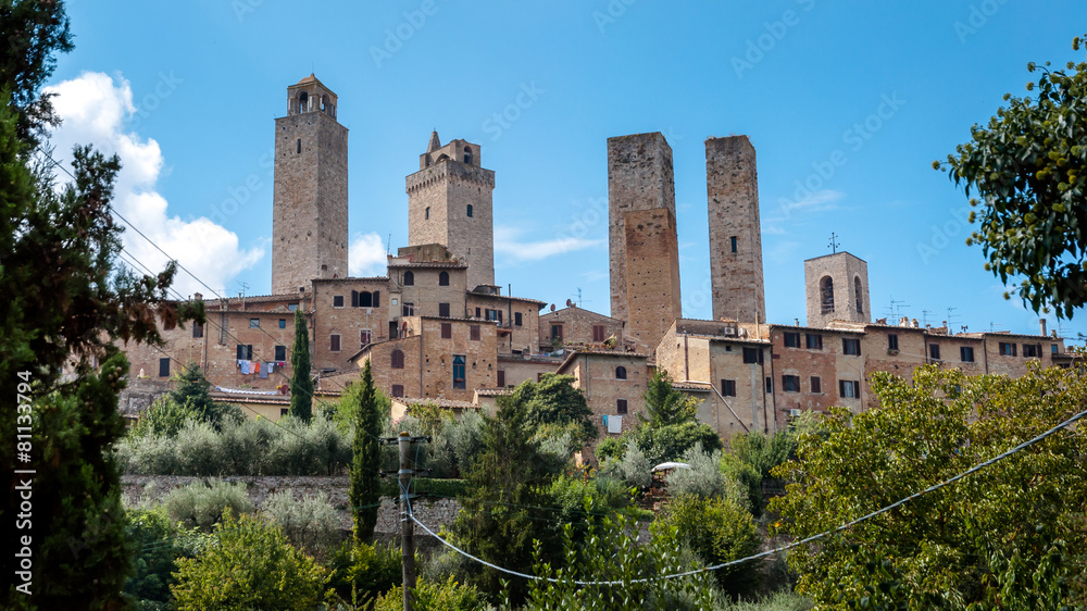 Towers and houses natural surroundings at San Gimignano
