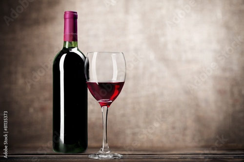 Wine Bottle. Red wine bottle and glass, isolated on white